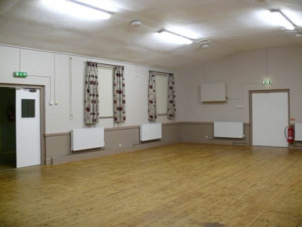 A room with a wooden floor and doors

AI-generated content may be incorrect.